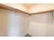 Spacious walk-in closet with sturdy shelving provides ample storage space at 3115 N 26Th St, Phoenix, AZ 85016