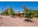 A charming red-brick home with desert landscaping and mature trees at 3115 N 26Th St, Phoenix, AZ 85016