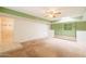 Bright living room with skylight, bonus room access, and large open space at 3115 N 26Th St, Phoenix, AZ 85016