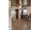 Inviting room with wood-look floors and archway, ready for personalization and comfortable living at 3115 N 26Th St, Phoenix, AZ 85016