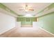 Open floor plan in living room featuring skylight, bonus room access, and modern look at 3115 N 26Th St, Phoenix, AZ 85016