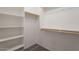 Walk-in closet featuring built-in shelving and rod for optimal organization at 316 N 78Th Pl, Mesa, AZ 85207
