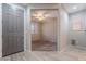 Inviting entryway features stylish wood-look tile flooring and a glimpse into a carpeted living area at 316 N 78Th Pl, Mesa, AZ 85207
