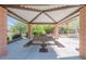Community gazebo with picnic tables, located near playground equipment, and green space at 316 N 78Th Pl, Mesa, AZ 85207
