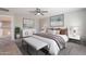 Inviting main bedroom featuring neutral decor, stylish furnishings, and a comfortable king-size bed at 316 N 78Th Pl, Mesa, AZ 85207