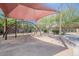 Community playground with climbing structure and shade, located near swimming pool at 316 N 78Th Pl, Mesa, AZ 85207