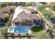 Expansive aerial view of property showing pool, patio, landscaping, and neighborhood at 32819 N 23Rd Ave, Phoenix, AZ 85085