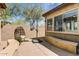 Backyard patio featuring comfortable seating with desert landscaping views at 32819 N 23Rd Ave, Phoenix, AZ 85085
