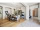 Elegant dining room with wood floors, stylish table setting, and decorative accents at 32819 N 23Rd Ave, Phoenix, AZ 85085
