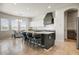 Modern kitchen features a large island and stainless steel appliances at 32819 N 23Rd Ave, Phoenix, AZ 85085