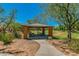 Community picnic area with covered tables, grassy lawn, and mature trees at 32819 N 23Rd Ave, Phoenix, AZ 85085