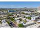 Aerial shot displays the apartment complex set against a mountain backdrop at 3655 N 5Th Ave # 202, Phoenix, AZ 85013