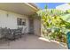 Outdoor patio featuring seating with a metal table and chairs and tropical plants at 3655 N 5Th Ave # 202, Phoenix, AZ 85013