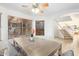 Bright dining room featuring a wooden table, neutral decor, and sunlit windows at 4341 E Abraham Ln, Phoenix, AZ 85050