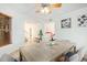 Bright dining area with modern table and seating, with easy access to living room and kitchen at 4341 E Abraham Ln, Phoenix, AZ 85050