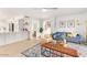 Living area with easy access to kitchen and dining area, featuring modern furnishings at 4341 E Abraham Ln, Phoenix, AZ 85050
