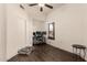Bright home office with a large window and hard flooring, perfect for productivity at 43803 W Wade Dr, Maricopa, AZ 85138