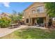 Backyard featuring a patio with a grill and an outdoor dining area at 4430 E Creosote Dr, Cave Creek, AZ 85331