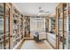 Inviting home office with built-in bookshelves, desk, and window seat at 4430 E Creosote Dr, Cave Creek, AZ 85331