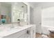 Bathroom features a double sink vanity, large mirror, and abundant natural light at 4637 S Jetty --, Mesa, AZ 85212