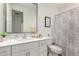 Well-lit bathroom featuring a modern vanity, neutral tones, and a shower-tub combination at 4637 S Jetty --, Mesa, AZ 85212