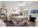 Cozy bedroom featuring a plush bed, neutral tones, and stylish decor that creates a relaxing atmosphere at 4637 S Jetty --, Mesa, AZ 85212