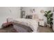 Well-lit bedroom with a comfortable bed, neutral tones, and decor that create a relaxing atmosphere at 4637 S Jetty --, Mesa, AZ 85212