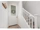 Bright entryway featuring modern stairs and a stylish front door with a glass panel at 4637 S Jetty --, Mesa, AZ 85212