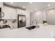Bright kitchen features stainless steel appliances, ample white cabinetry, quartz countertops, and large single basin sink at 4637 S Jetty --, Mesa, AZ 85212