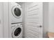 Convenient laundry area with stacked washer and dryer, maximizing space efficiency at 4637 S Jetty --, Mesa, AZ 85212