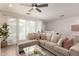 Comfortable living room area bathed in natural light, showcasing a cozy sectional sofa at 4637 S Jetty --, Mesa, AZ 85212