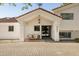 Front entryway with seating and tiled front yard at 5202 E Larkspur Dr, Scottsdale, AZ 85254