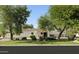 Street view of two-story home with mature trees at 5202 E Larkspur Dr, Scottsdale, AZ 85254