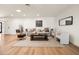 Stylish living room with cozy seating, recessed lighting, and natural light that creates a warm atmosphere at 5202 E Larkspur Dr, Scottsdale, AZ 85254