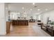 Open-concept living space with a large island, dining area, and comfortable seating providing space for entertaining at 5202 E Larkspur Dr, Scottsdale, AZ 85254