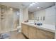 Bathroom featuring a glass-enclosed shower and sleek vanity at 535 W Thomas Rd # 513, Phoenix, AZ 85013