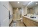 Modern bathroom features a glass-enclosed shower and sleek vanity with ample storage at 535 W Thomas Rd # 513, Phoenix, AZ 85013
