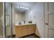 Beautiful bathroom featuring a modern vanity, sleek fixtures, and stylish mirror at 535 W Thomas Rd # 513, Phoenix, AZ 85013