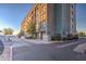 Multi-story building with lush landscaping and parking spaces at 535 W Thomas Rd # 513, Phoenix, AZ 85013