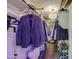 Walk-in closet featuring a chandelier and custom shelving for organized storage at 535 W Thomas Rd # 513, Phoenix, AZ 85013