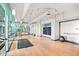 Spacious fitness studio with hardwood floors, mirrors, and ballet barres for versatile workouts at 535 W Thomas Rd # 513, Phoenix, AZ 85013