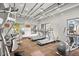 Well-equipped gym featuring treadmills, weight machines, and ample space for a full workout at 535 W Thomas Rd # 513, Phoenix, AZ 85013