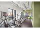 Bright gym with cardio machines, free weights, and mirrors for a complete fitness experience at 535 W Thomas Rd # 513, Phoenix, AZ 85013