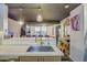 Bright kitchen with a large island, stainless steel sink, and modern fixtures at 535 W Thomas Rd # 513, Phoenix, AZ 85013