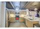 Well-equipped kitchen featuring stainless steel appliances and modern wood cabinets at 535 W Thomas Rd # 513, Phoenix, AZ 85013