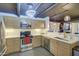 Modern kitchen with stainless steel appliances, sleek countertops, and ample cabinet space at 535 W Thomas Rd # 513, Phoenix, AZ 85013