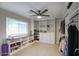 Spacious walk-in closet with custom built-in shelving and plenty of storage space at 5441 E Wethersfield Rd, Scottsdale, AZ 85254