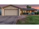 Charming single-Gathering home featuring a well-maintained lawn and a two-car garage at 5529 W Villa Maria Dr, Glendale, AZ 85308