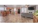 This open-concept kitchen, dining, and living area is perfect for entertaining or everyday living at 5529 W Villa Maria Dr, Glendale, AZ 85308