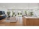 Open-concept living space with access to backyard and kitchen at 5537 E Earll Dr, Phoenix, AZ 85018